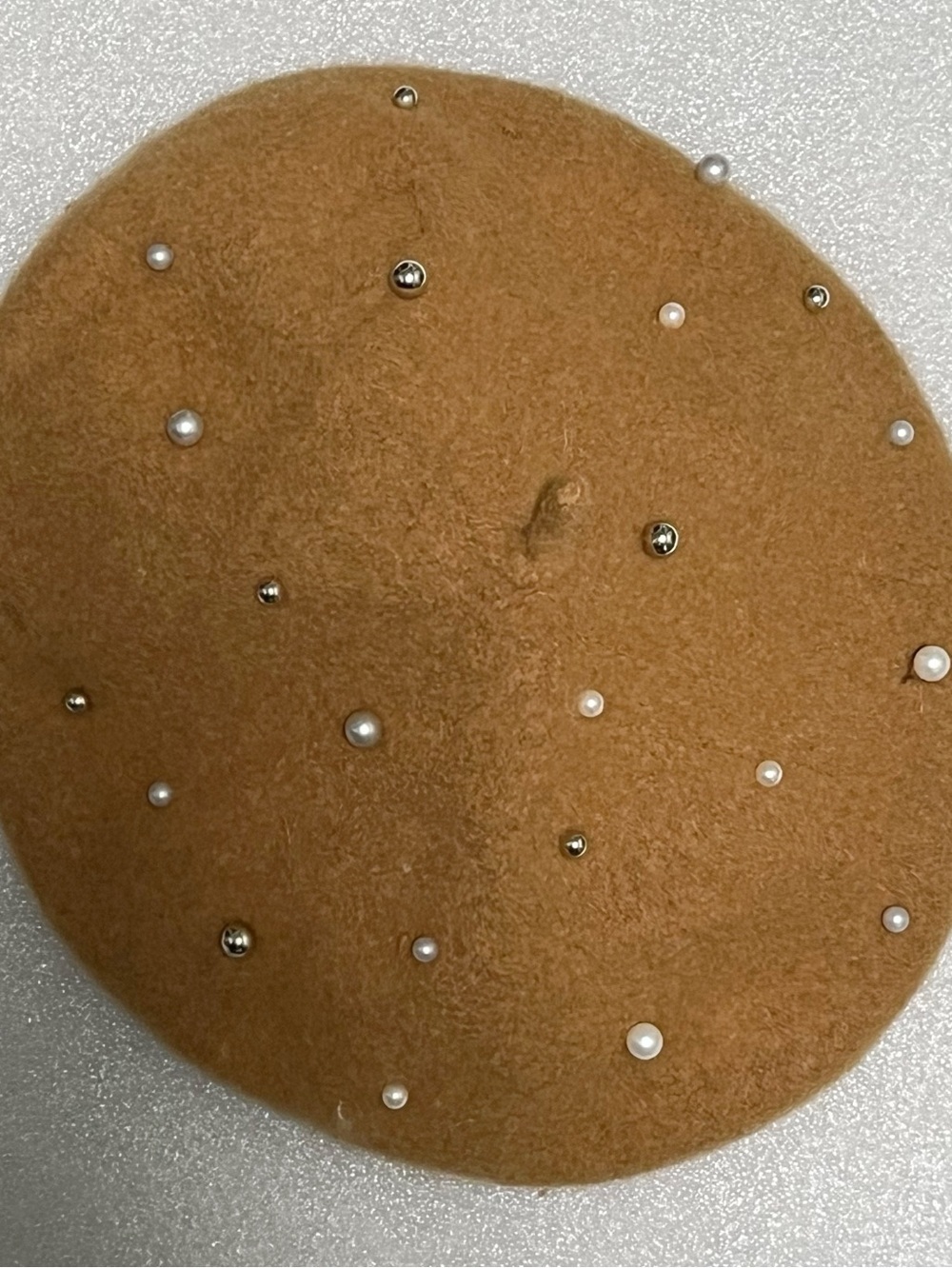 Stylish pearl-embellished camel color pearl and studded wool French beret
